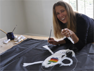 Susan Kare hand painting canvas pirate flag